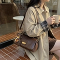 Vintage dark brown crossbody bag with wooden bead charm on a khaki trench coat model - With Charm / Coffee