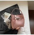 Pink lychee grain bucket bag with silver turn-lock and grey plush rabbit charm - Pink with Pendant