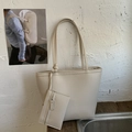 Detail of soft cream tote bag with matching zip pouch and pebble leather texture - White