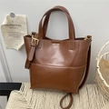 Brown faux leather bucket tote bag with gold metal hardware and detachable strap - Brown