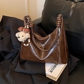 Dark brown hobo tote bag in vintage oil wax leather with a plush bear charm - With Charm / Brown