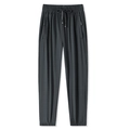 Dunkelgraue Jogginghose mit Kordelzug und Reißverschlusstaschen aus schnelltrocknendem Stoff - L / Herren Dunkelgrau - Jogger