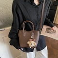 Dark brown lychee texture bucket bag with plush bear charm and crossbody strap - Coffee (With Charm)