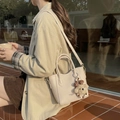 Beige litchi grain bucket bag with teddy bear pendant and thin shoulder strap - Rice White (With Charm)