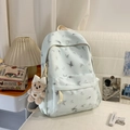 Mintgrüner Schulrucksack mit grauem Schmetterlingsdruck und Plüschbär-Anhänger - Mit Anhänger / Blau