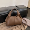 Brown pleated dumpling bag with leather texture and versatile shoulder strap style - Brown