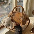 Brown Boston cylinder handbag with belt decoration and plush bunny charm accessory - Orange (With Charm)