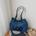 Blue denim shoulder tote bag with black leather handles and slogan print detail - Denim Black