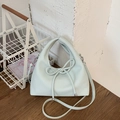 Light blue faux leather handbag with bow detail and adjustable shoulder strap - Blue