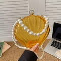 Gelbe lichtdurchlässige Muschel-Clutch aus Acryl mit Griff und Riemen aus Kunstperlen - Modell 1 Gelb