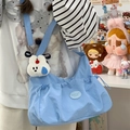 Borsa a nuvola plissettata in nylon azzurro con ciondolo a coniglio bianco e tracolla - Blu con Pendente