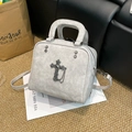 Gray vintage faux leather handbag with metal cross charm and studded detail on side - Gray
