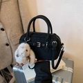 Retro black Boston handbag with matte leather finish and cute white plush rabbit charm - Black with Pendant