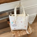 Beige tote bag with rabbit print, including a plush bunny keychain and shoulder strap - Off White