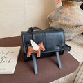 Retro black leather shoulder bag with decorative straps and a small winged horse charm - Black with Pendant