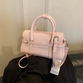 Elegante bolso de mano en piel sintética rosa claro con asas redondas y correa móvil - Rosa