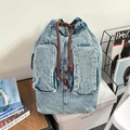 Zaino in denim lavato azzurro con coulisse e due tasche anteriori in stile vintage - Azzurro
