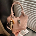 Pink vintage bucket bag with decorative beads and knotted handle in leather style - Pink