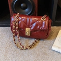 Quilted dark red faux leather flap bag with gold chain strap and twist lock - Red