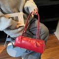Chic red baguette handbag in smooth leather with slim double handles and gold lettering - Burgundy
