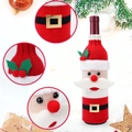 Detail of Santa knitted wine bottle cover with golden buckle and festive Christmas ornaments - Santa Shape
