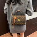 Classic dark brown vintage print handbag with metallic turn-lock and leather tassel - Coffee with Brown