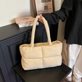 Quilted beige puffer tote bag featuring a spacious design and lightweight nylon fabric - Khaki