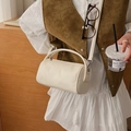 Elegante borsa a cilindro beige in ecopelle opaca con doppi manici e tracolla lunga - Bianco Sporco