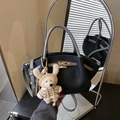 Litchi pattern leather bucket bag in black and grey with a cute bear charm accessory - Black with Pendant