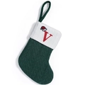 Dark green knitted Christmas stocking with white cuff and red embroidered letter V - Letter V