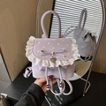 Mini zainetto viola chiaro a pois con pizzo e decorazione a fiocco - Viola