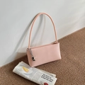 Minimalist soft pink leather shoulder bag with stylish silver metal charm pendant - With Pendant / Pink