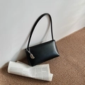 Minimalist black matte leather shoulder bag featuring a silver bean metal pendant - With Pendant / Black