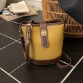 Bolso saco vintage amarillo mostaza con borde marrón y cierre giratorio dorado - Marrón Amarillento