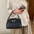 Classic black leather Kelly style bag with silver clasp and pebble grain finish - Black
