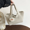 Oatmeal thick knit tote bag with handmade leather label charm and rib texture - Off-white