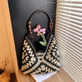 Handwoven geometric tote bag with black and white patterns and circular wooden handles - White and Black Patchwork