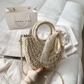 Elegant hand-woven straw beach bag featuring a delicate white lace ribbon bow - Beige
