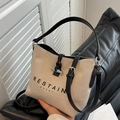 Secchiello in tela beige con tracolla in pelle nera e dettagli argentati - Bianco Sporco