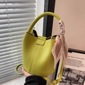 Chic lemon green lychee leather bucket bag with decorative silk scarf and thin strap - Green