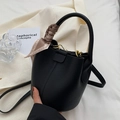 Black litchi grain bucket bag with a patterned silk scarf handle and long strap - Black