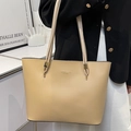 Schicke beige Tragetasche aus glattem PU-Leder mit viel Platz und schmalen Riemen - Khaki