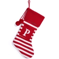 Knitted red and white striped Christmas stocking featuring a fuzzy red pompom and letter P - Red and White Striped Letter P