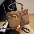 Petit sac seau marron en cuir et tissu avec bandoulière et zips dorés - Marron