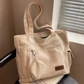 Borsa tote minimalista in tela color crema con tasche laterali e mini portamonete - Bianco Sporco