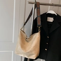 Beige large hobo bag with ethnic embroidered wide strap and soft leather texture - Off White