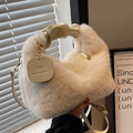 Elegant white plush faux fur handbag with a leather handle and a gold chain charm - White