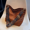 Brown vintage bohemian shoulder bag with a colorful ethnic geometric pattern wide strap - Caramel color