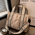 Beige quilted nylon tote bag with wave stitching and wide adjustable shoulder strap - Off White