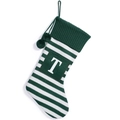 Green and white striped knitted Christmas stocking featuring white letter T and pompoms - Green and White Striped Letter T
